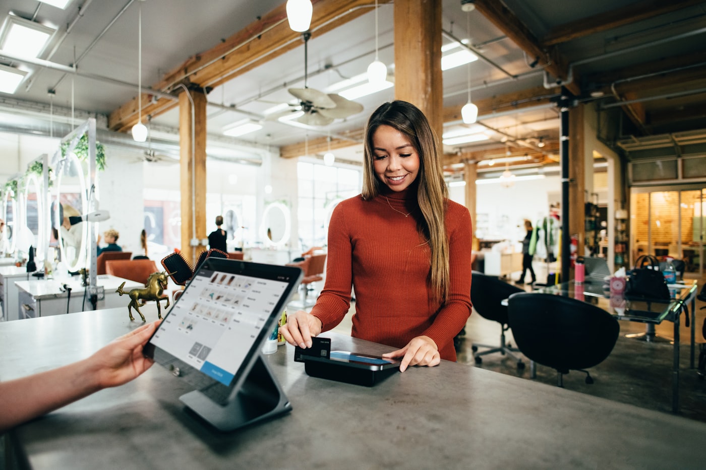 A point-of-sale card terminal on a counter